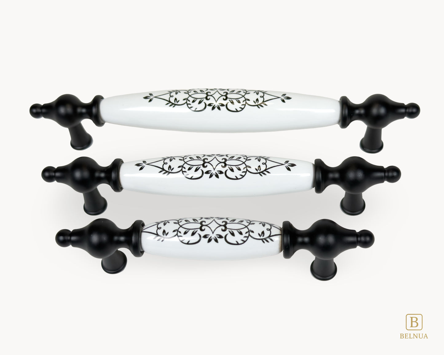 Perspective view of Lumora black porcelain handles showing floral pattern and matte black base