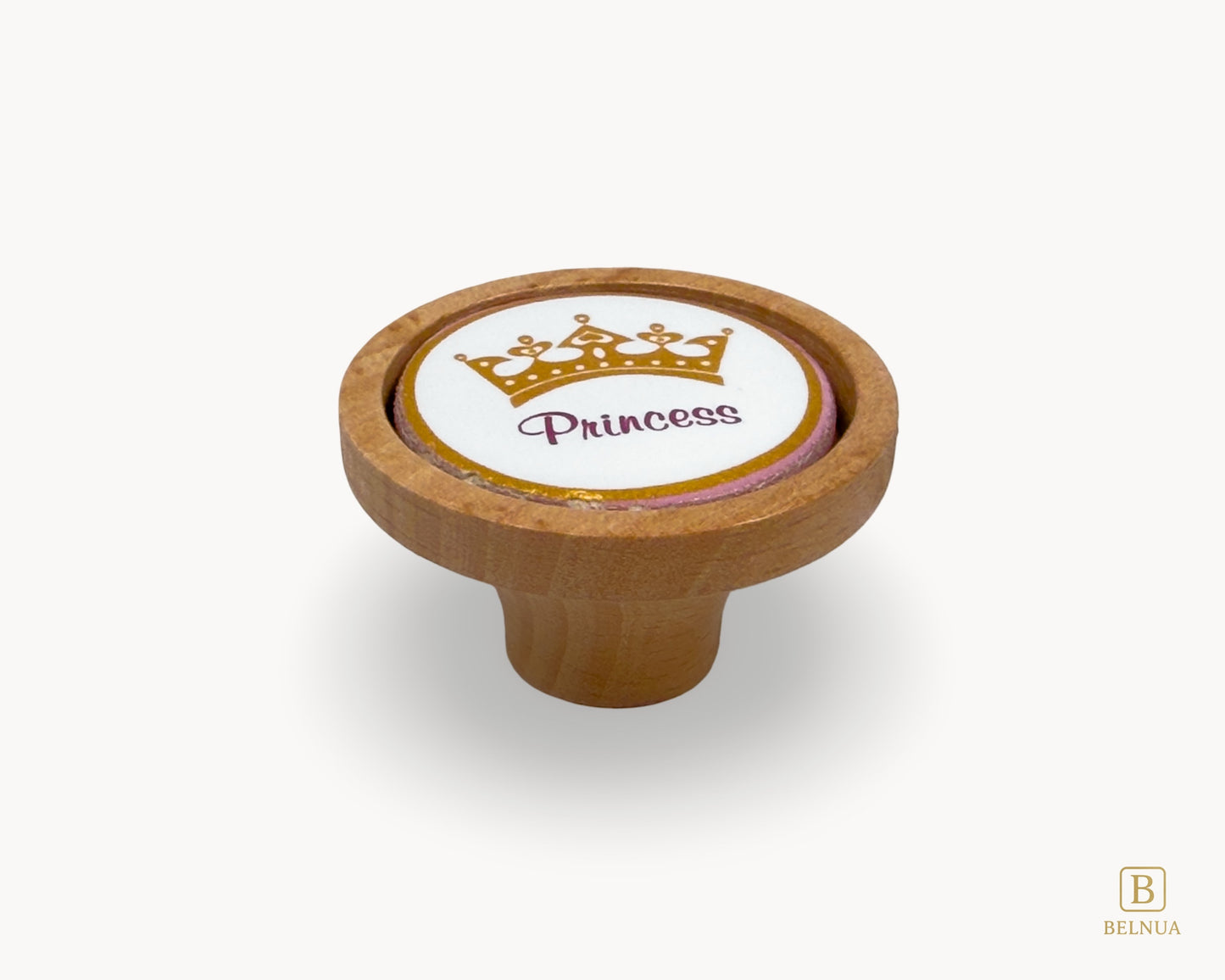 Belnua - Front view of Nuvino oak wood knob with porcelain/ceramic insert with princes crown design for girls, children, nursery rooms