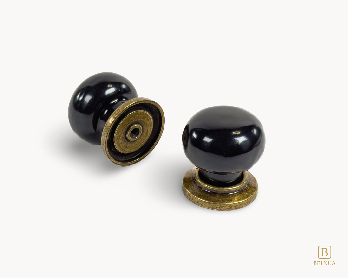 Top and back view of black ceramic knobs and brass bases from Zerra collection | Belnua