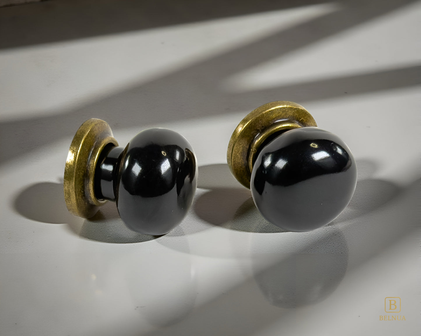 ZERRA Knob – Antique Brass with Porcelain Insert (Black)