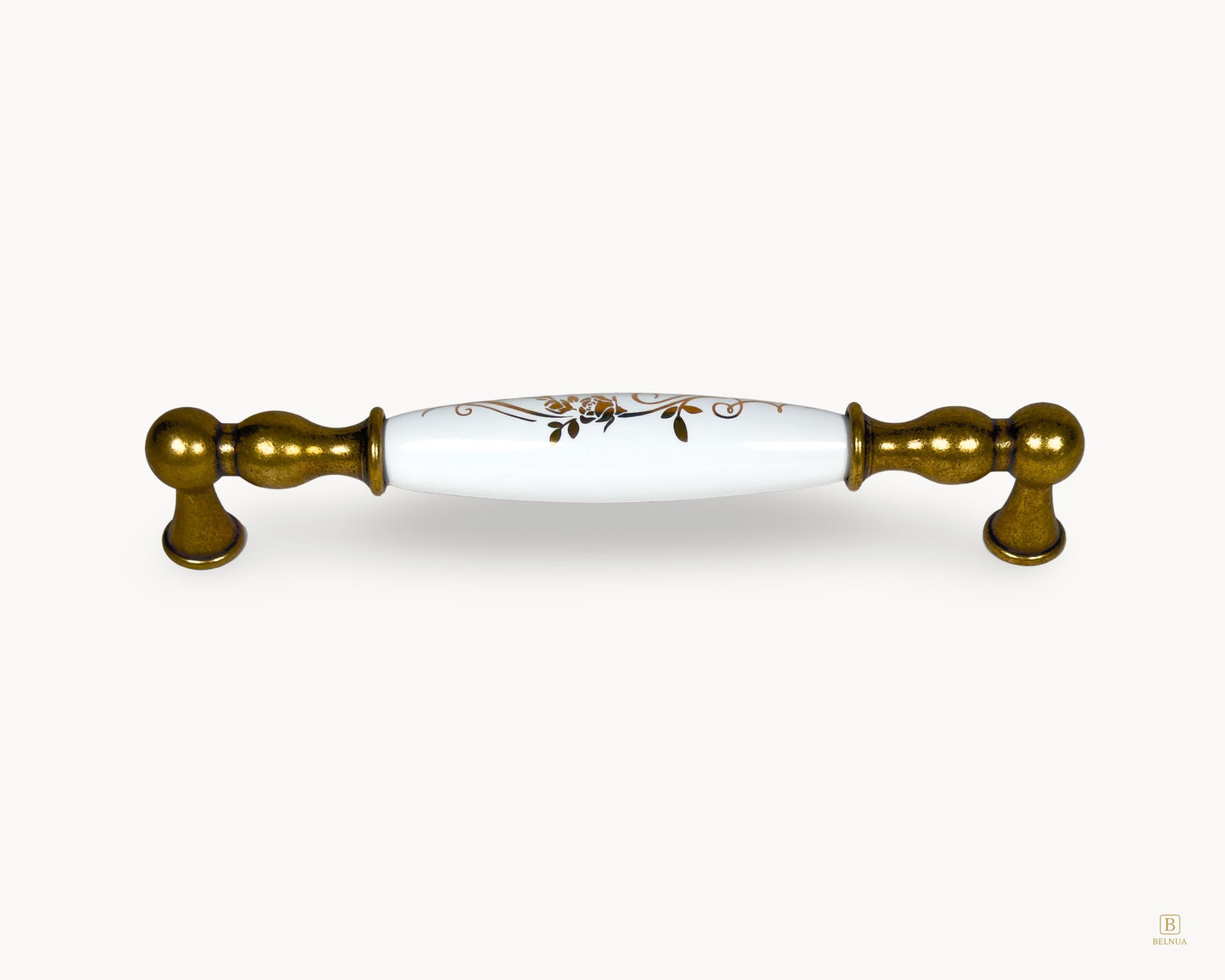 Belnua Belmira antique brass handle with white porcelain insert and golden scroll motif, 160mm centre to centre