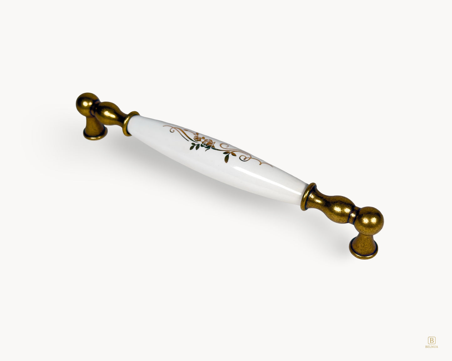 192mm Belmira handle in antique brass with white porcelain insert