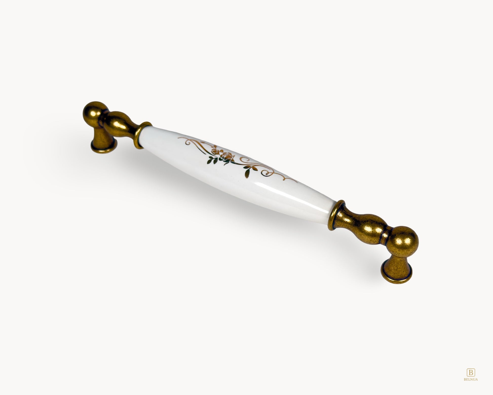 192mm Belmira handle in antique brass with white porcelain insert