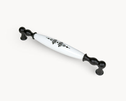 Angled view of Belmira black porcelain handle 192mm with decorative Midnight Blossom design