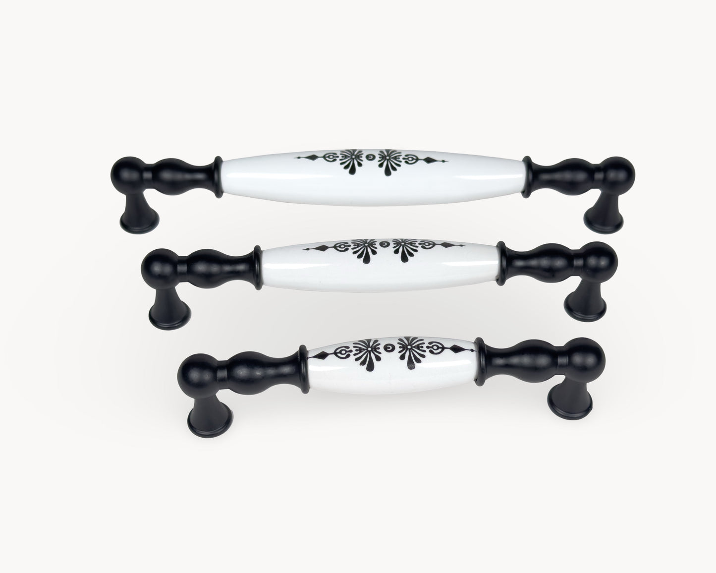 Size comparison of Belmira black porcelain handles with Midnight Blossom pattern in 128mm, 160mm and 192mm centre-to-centre lengths.