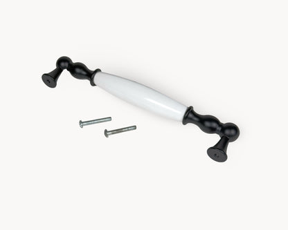 Belmira black porcelain cabinet handle with Midnight Blossom motif, 160mm centre to centre, shown with fixing screws