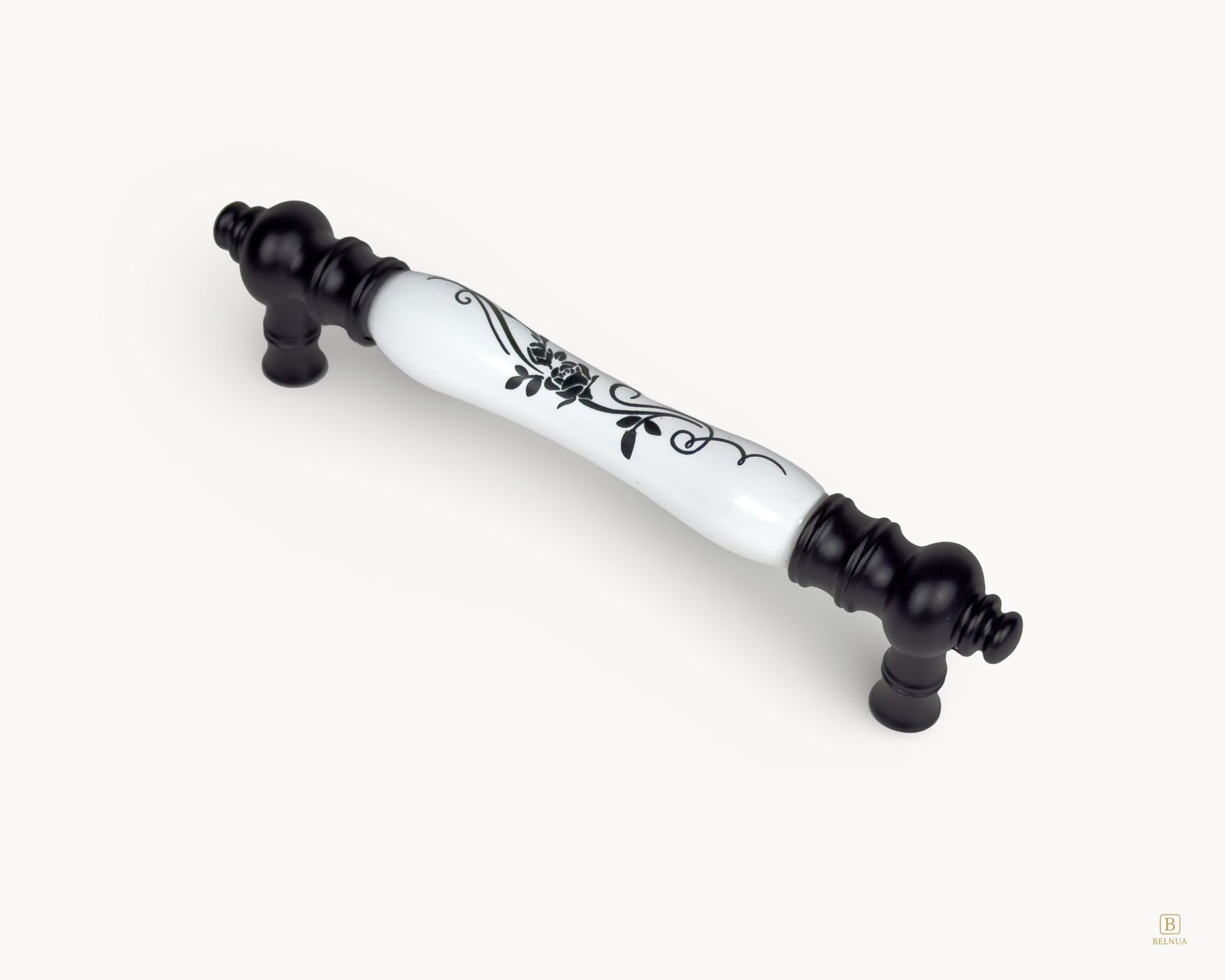 Angled view of Eloura black porcelain handle 128mm showing curved profile