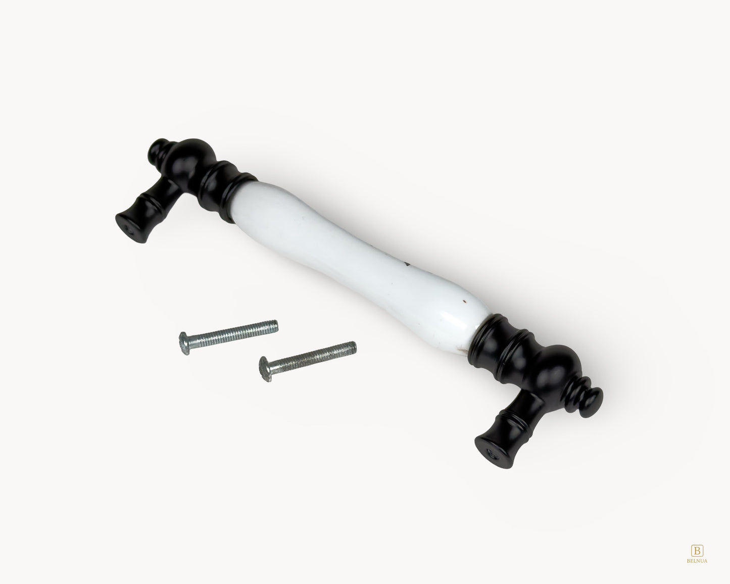 Eloura black porcelain 128mm cabinet handle shown with fixing screws included for installation