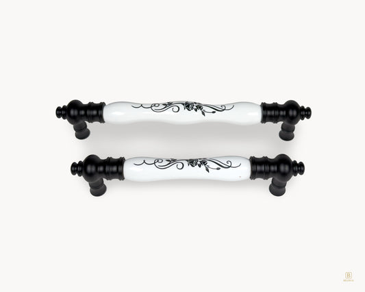 Belnua - Eloura black porcelain cabinet handles with white porcelain insert and black botanical motif, group front view