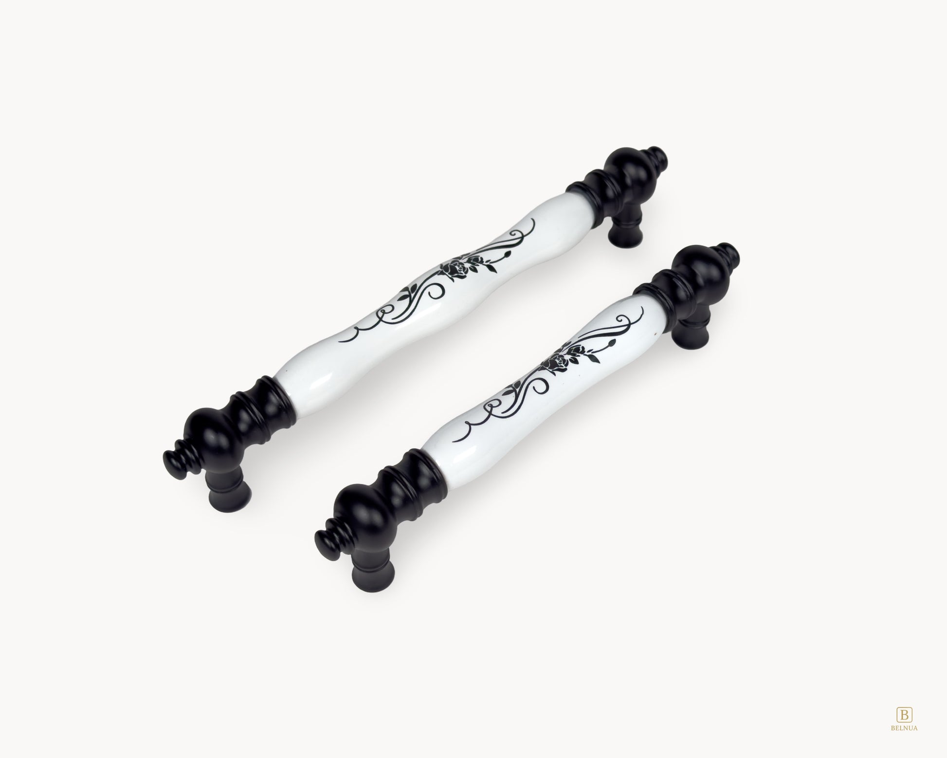 Group image of Eloura black handles highlighting curved porcelain shape and floral motif