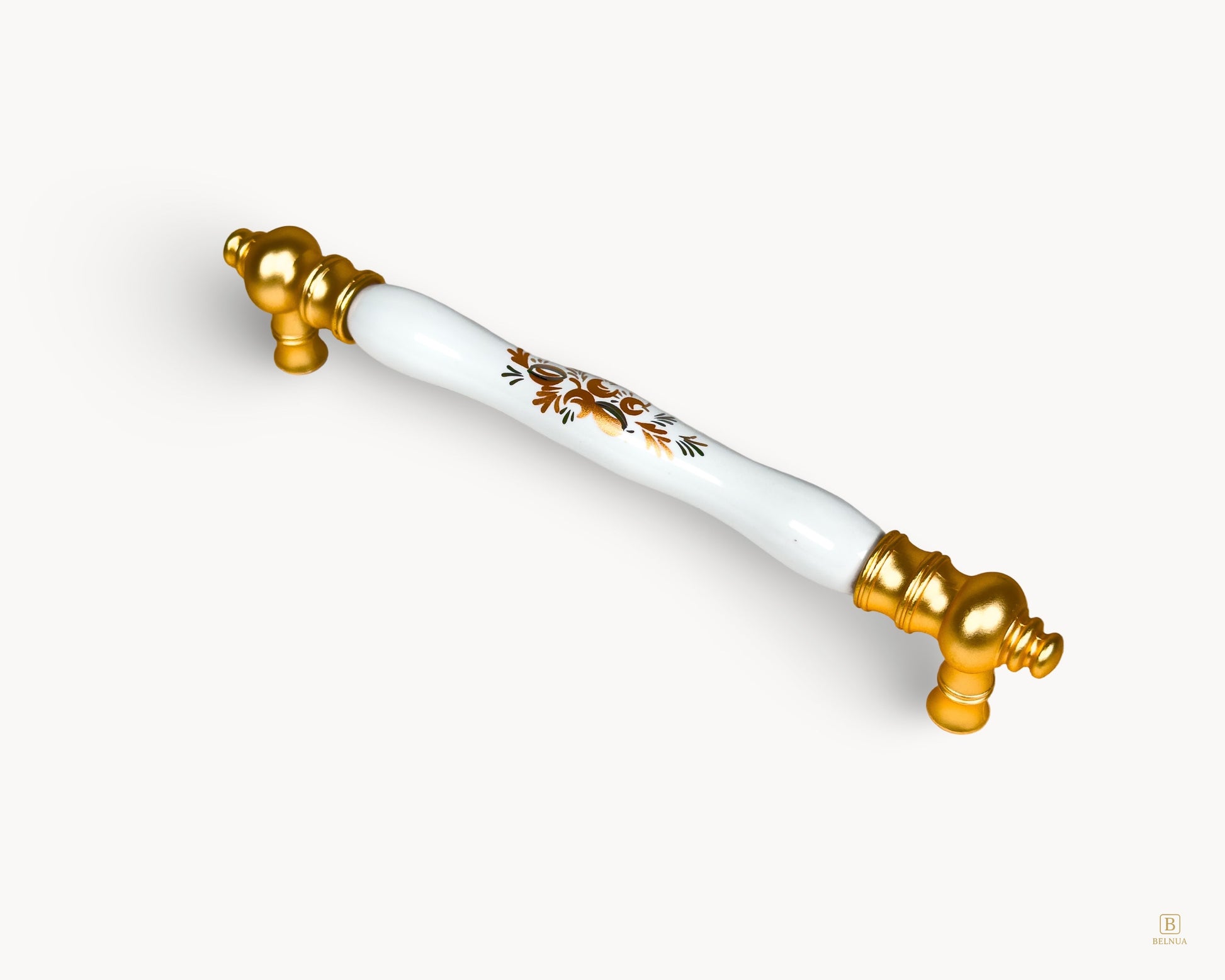 White porcelain handle with gold base and Golden Arch Bloom motif, 160 mm, angled view.