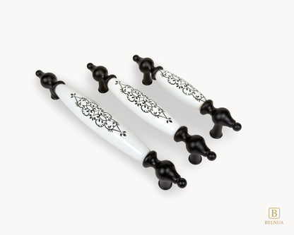 Three Lumora black porcelain handles displayed in angled layout