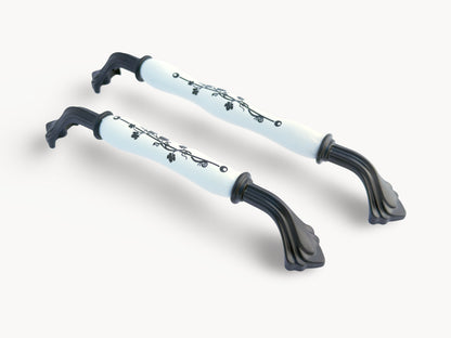 Belnua - Hero image of ROSMIRA decorative matte black handles with black leaf motif on white porcelain 