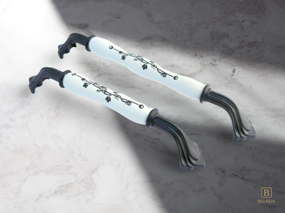 Belnua - Pair of Rosmira decorative matte black handle with black leaf motif on white porcelain featuring with marble work top
