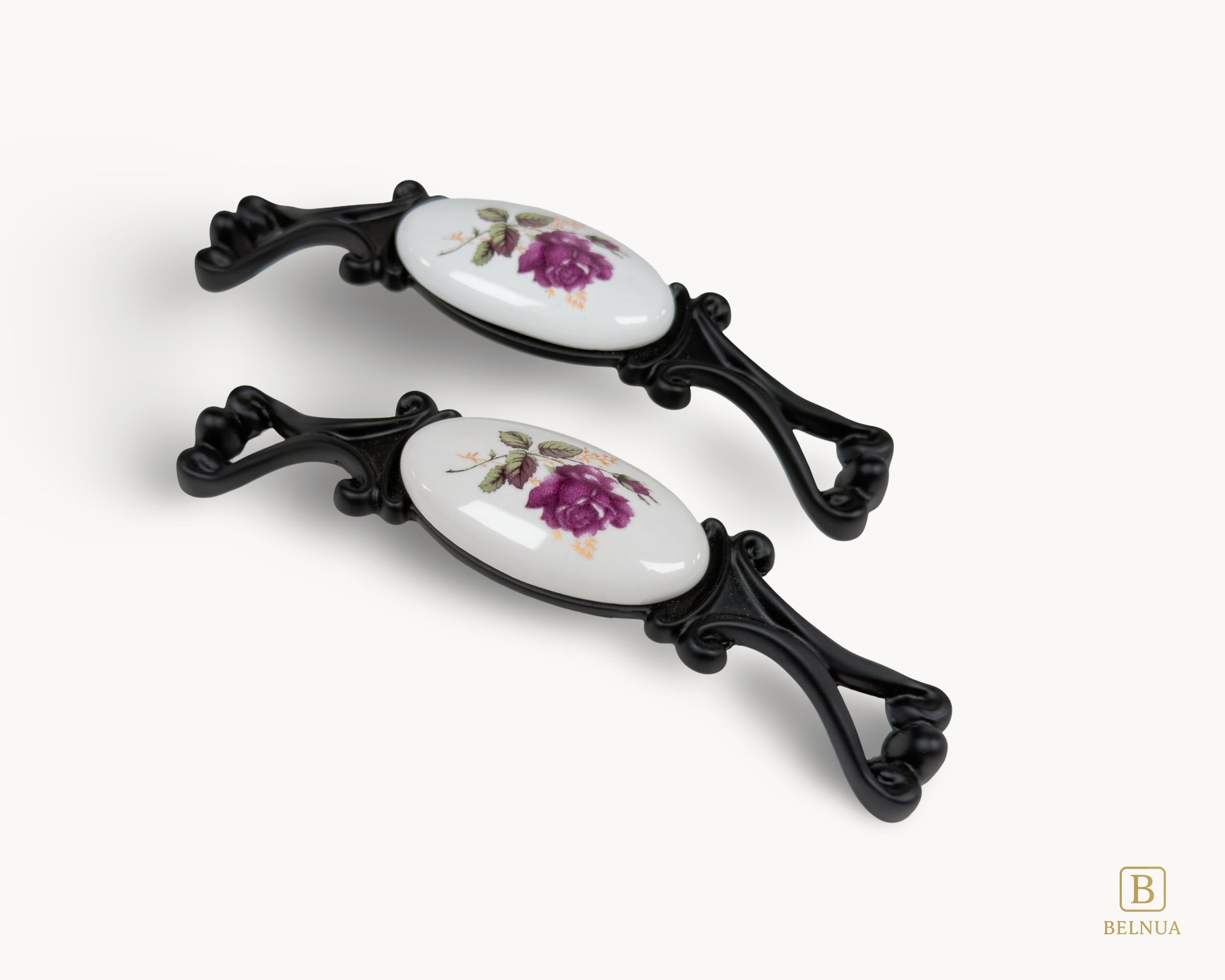 Belnua - Two decorative Nureya ceramic handles with floral designs on a white background