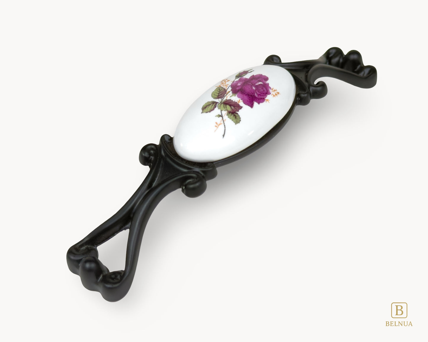 Belnua - Left angled view of Nureya drawer/cabinet pull handle with black metal base featuring rose motif on white ceramic/porcelain