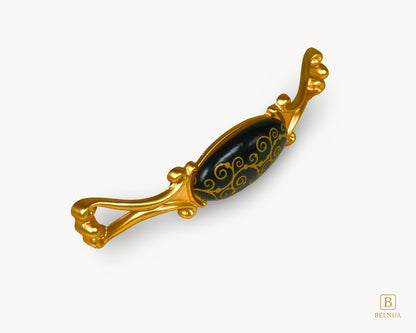 Belnua - Front angled view of Nureya gold handle with black porcelain insert 