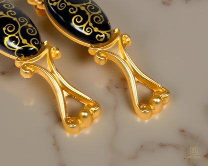 Belnua - Closeup view of Nureya gold cabinet handle base pairs with light brown marble worktop