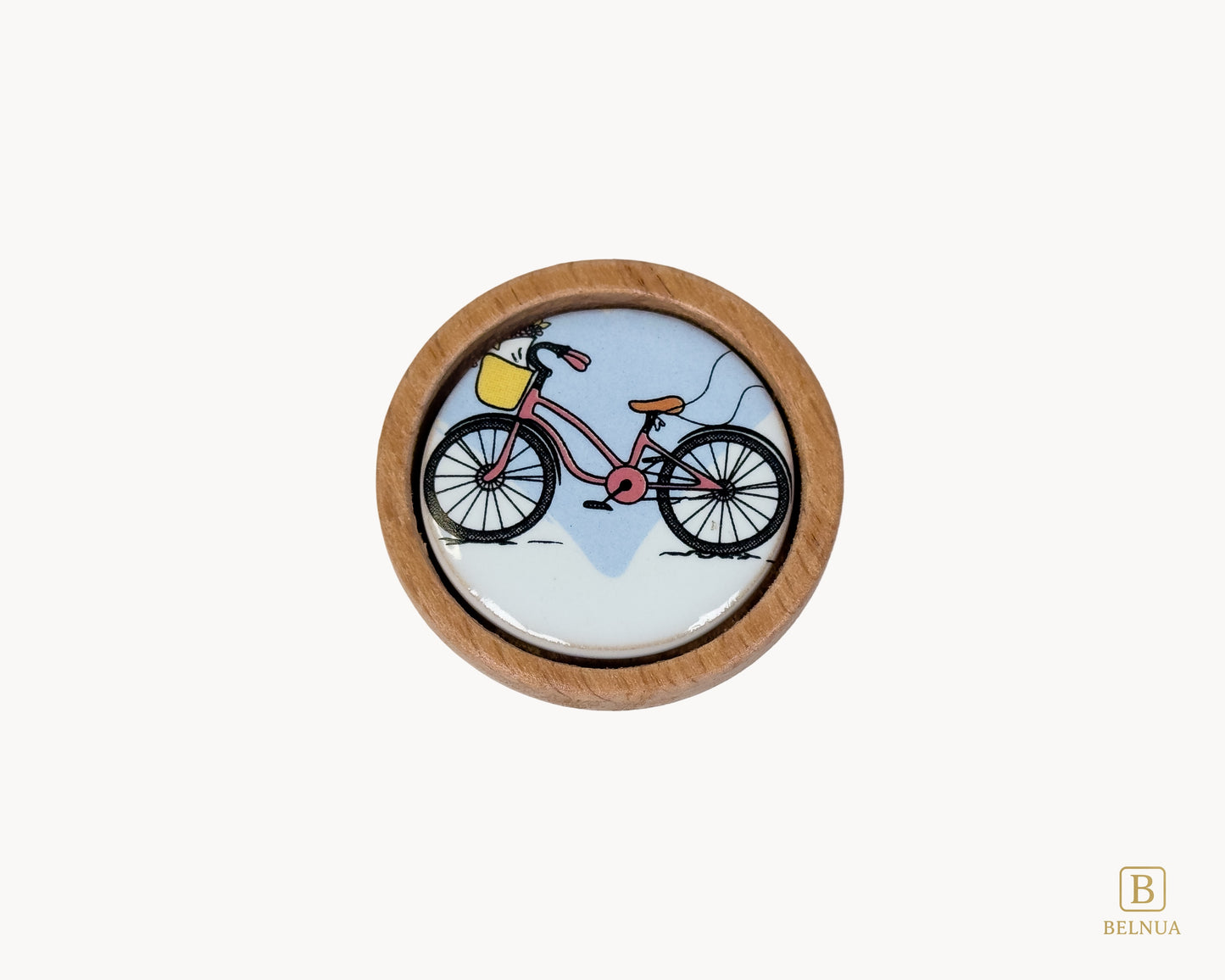 Belnua - Top closeup view of delicate Nuvino children natural oak wood knob with bicycle design porcelain insert for boys, girls, nursery, school, teens room and furniture