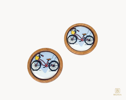 Belnua - Top closeup view of delicate and dreamy Nuvino children natural oak wood knob with bicycle design porcelain insert for boys, girls, nursery, school, teens room and furniture