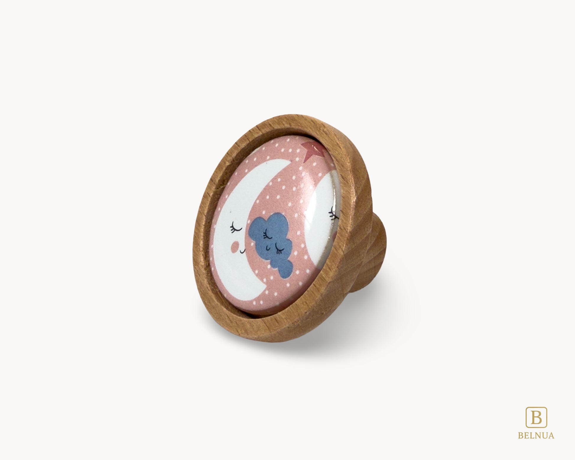 Belnua - Front left angled view of delicate Nuvino children knob with oak wood base and moon&star motif porcelain for nursery, children, teens, girls room and furniture