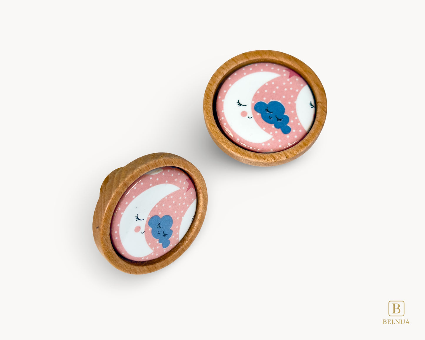 Belnua - Front right and top view of delicate and luxury Nuvino children knob pair with oak wood base and moon&star design porcelain for nursery, children, teens, girls room and furniture
