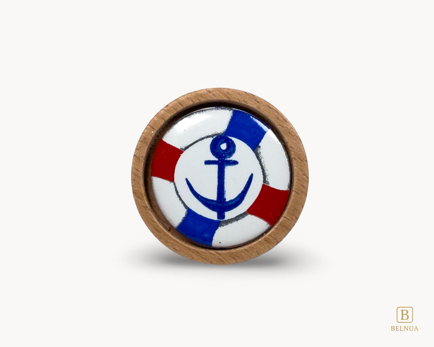 Belnua - Front flaatlay closeup view of dreamy Nuvino natural oak wood knob with nautical anchor porcelain design for kids, boys, teens rooms & wardrobe and nursery, school playrooms and storage. 