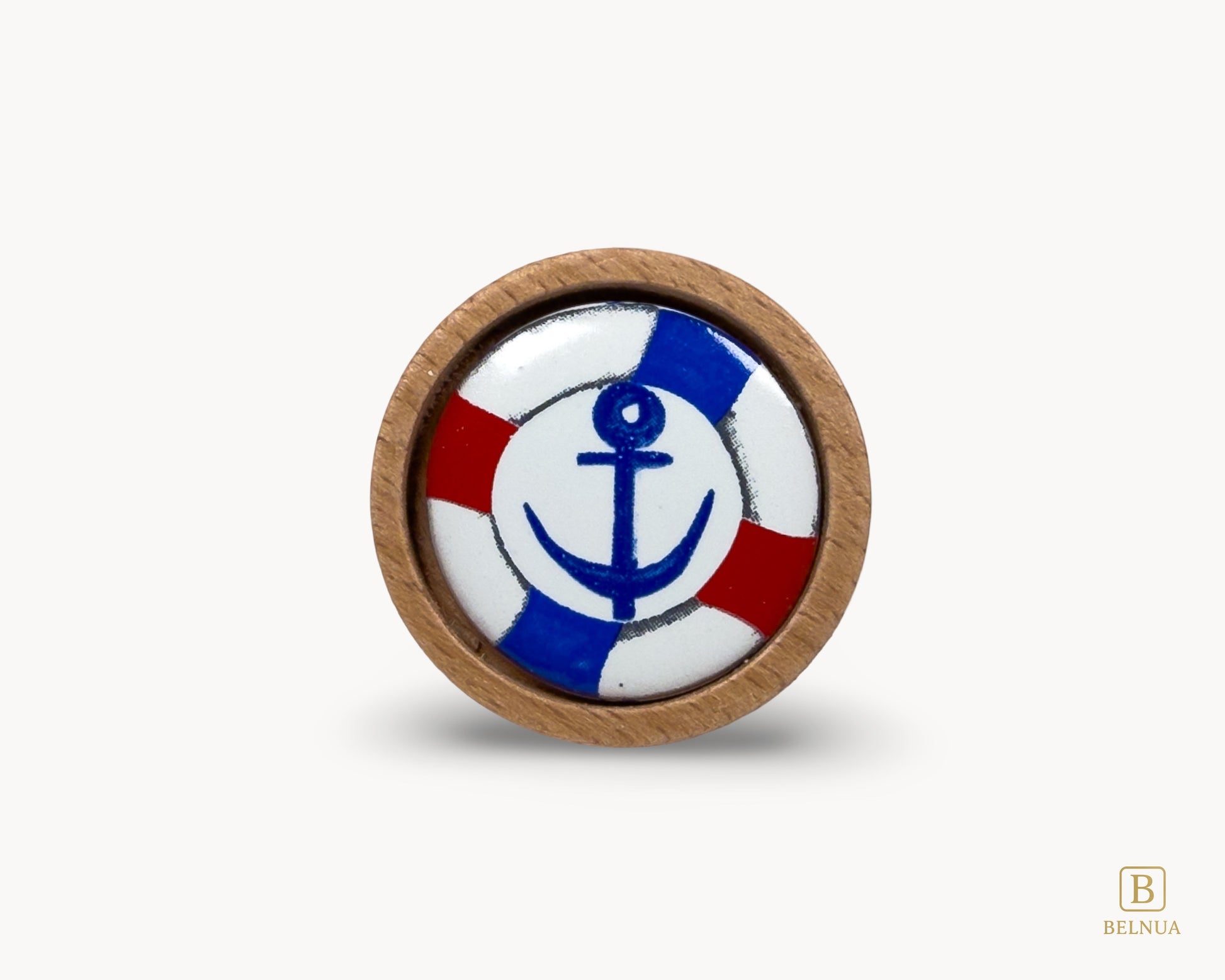 Belnua - Front flaatlay closeup view of dreamy Nuvino natural oak wood knob with nautical anchor porcelain design for kids, boys, teens rooms & wardrobe and nursery, school playrooms and storage. 