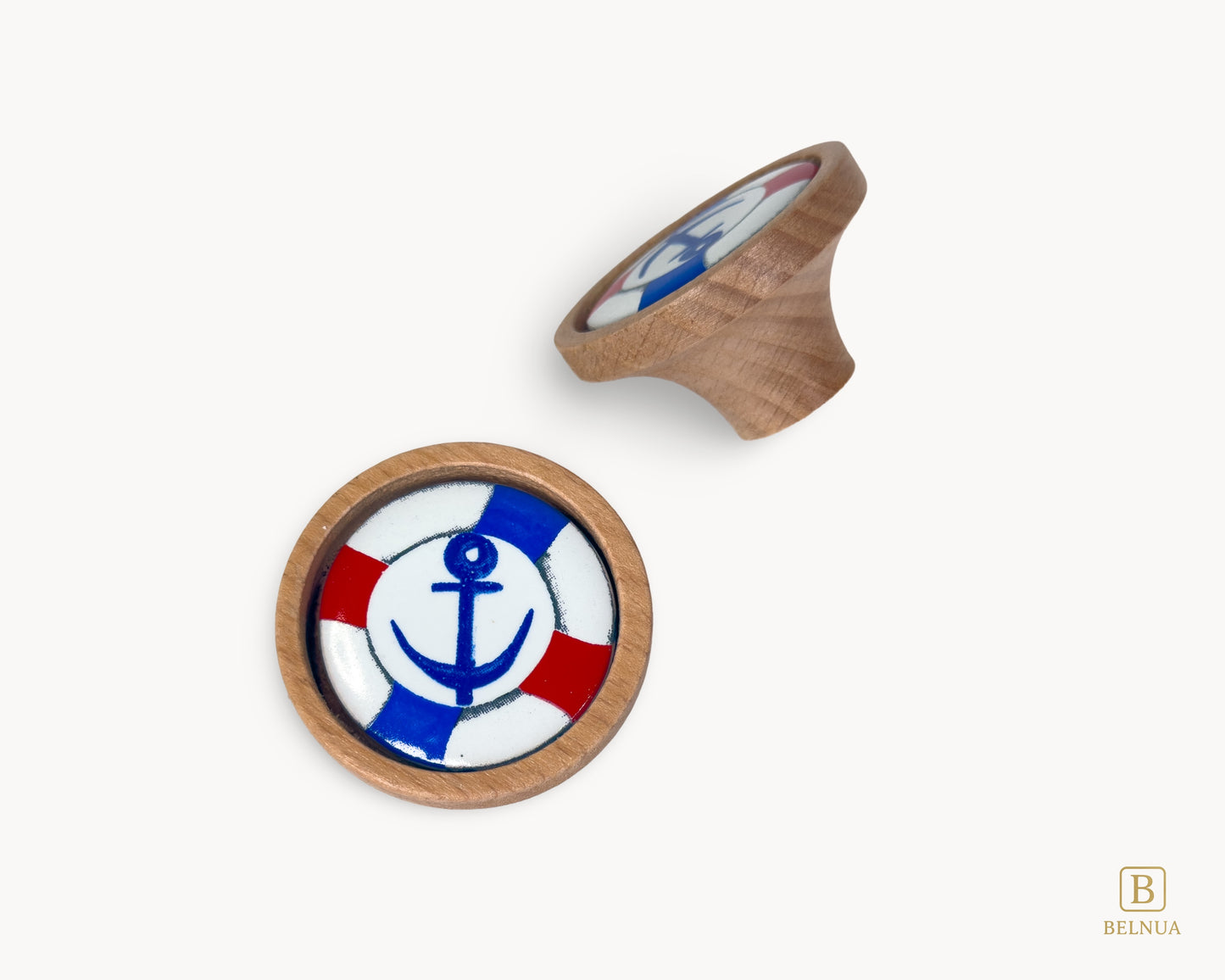 Belnua - Top and right back angled view of luxury Nuvino natural oak wood knob with nautical anchor porcelain design for boys, teens rooms & wardrobe and nursery, school playrooms and storage. 