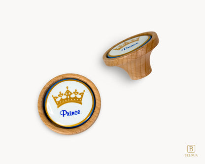 Belnua - Top and back view of Nuvino oak wood knob pair with prince crown porcelain insert for boys, children, teens room