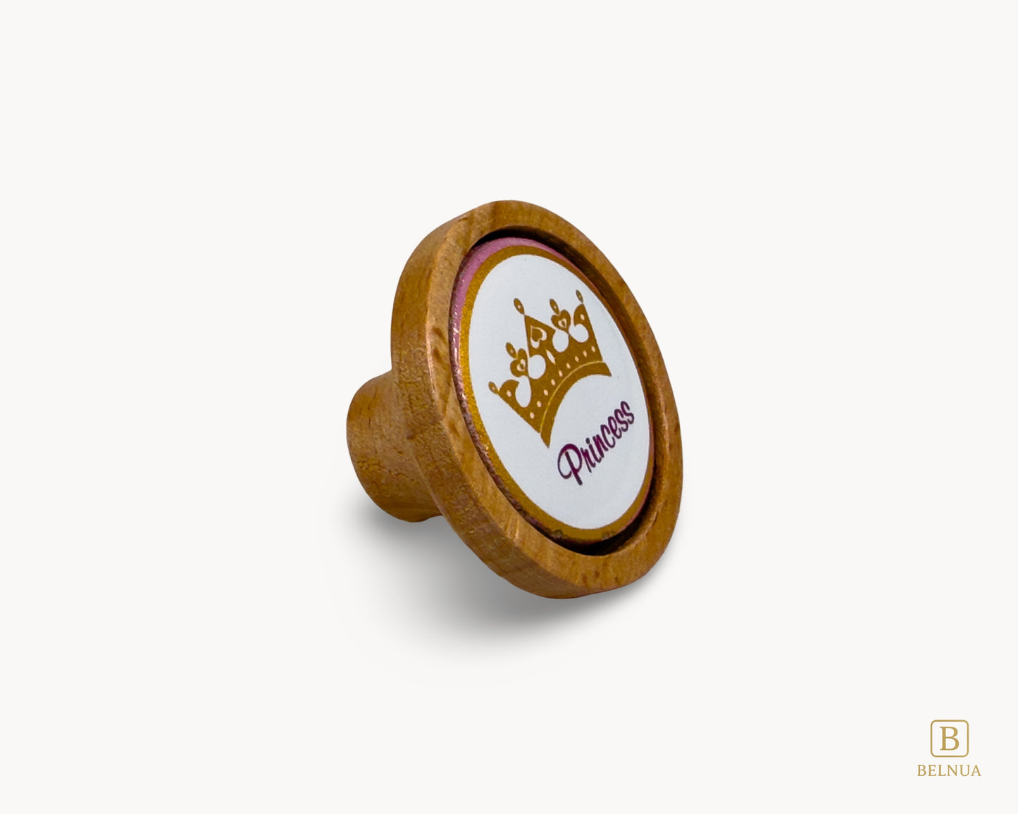 Belnua - Right angled view of Nuvino oak wood knob with porcelain/ceramic insert with princes crown design for girls, children, nursery and teen rooms