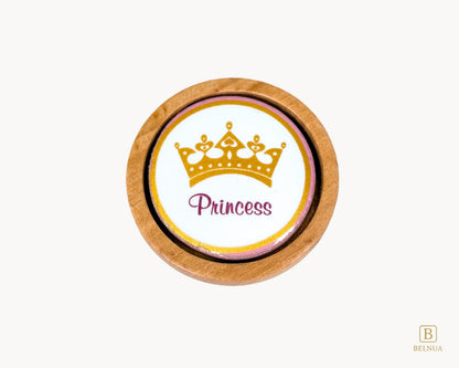 Belnua - Top closeup view of Nuvino oak wood knob with porcelain/ceramic insert with princes crown design for girls, teens, children, nursery rooms