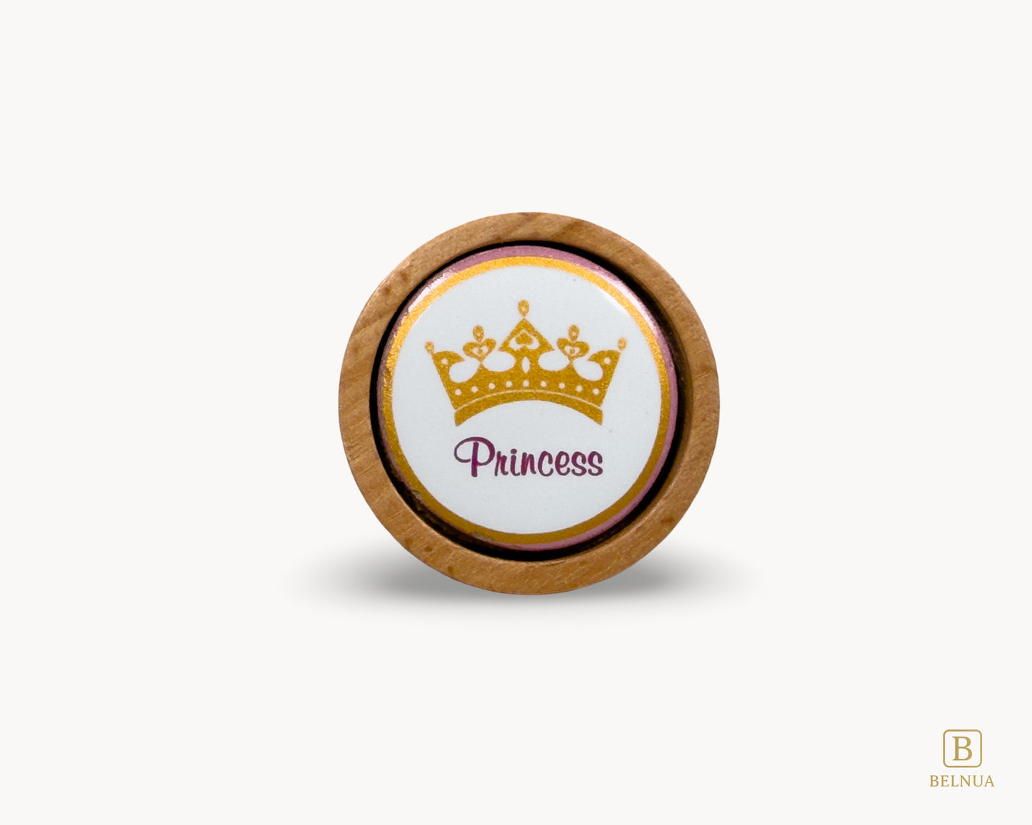 Belnua - Front view of Nuvino oak wood knob with porcelain/ceramic insert with princes crown design for girls, children, nursery rooms