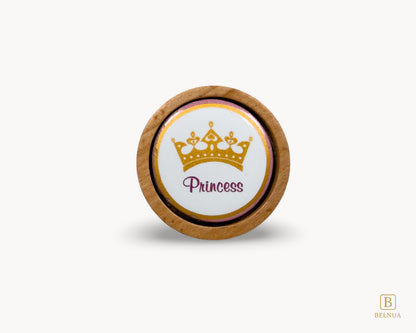 Belnua - Front view of Nuvino oak wood knob with porcelain/ceramic insert with princes crown design for girls, children, nursery rooms