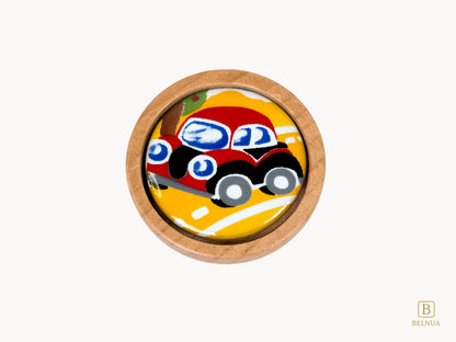 Belnua - Top closeup view of playful Nuvino oak wood knob with red car porcelain insert for boys, playroom, nursery, teens, children rooms and furniture