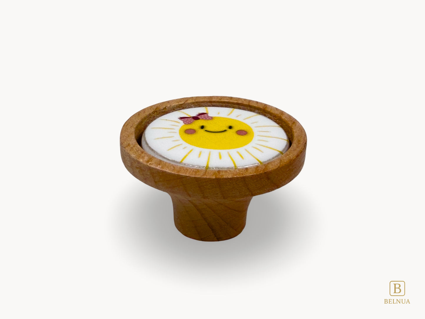 Belnua - Front flatlay of joyful Nuvino children natural oak wood knob with delicate smiling sun porcelain design for girls, children, teens rooms & wardrobe and nursery and school play rooms.