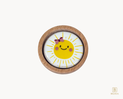 Belnua - Top closeup view of dreamy Nuvino children natural oak wood knob with delicate smiling sun porcelain design for girls, children, teens rooms & wardrobe and nursery and school play rooms.