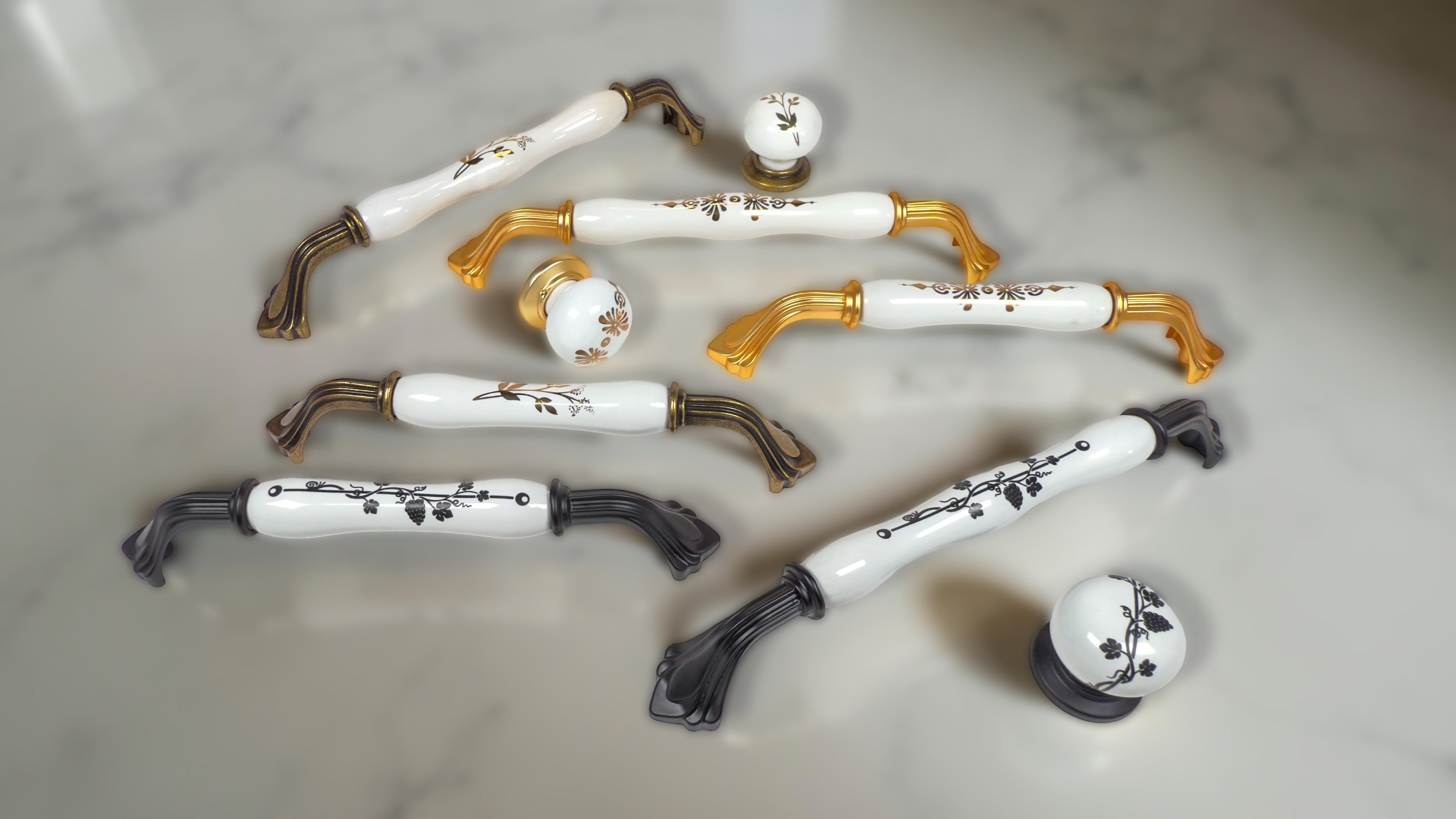 Belnua ROSMIRA Collection – luxury porcelain cabinet handles and knobs with floral patterns in matte gold, antique brass and matte black finishes.