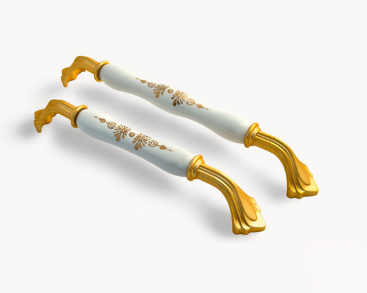 Belnua - Angled view showing golden finish and blossom motif on ceramic insert from Rosmira collection