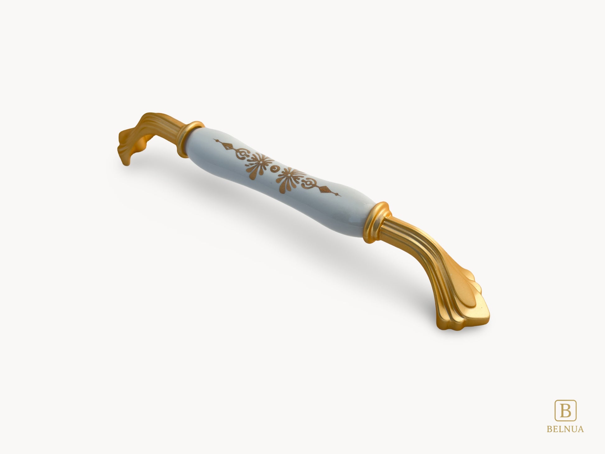 Belnua - Right angled view of rosmira gold handle (160mm) with white porcelain/ceramic featuring golden pattern 