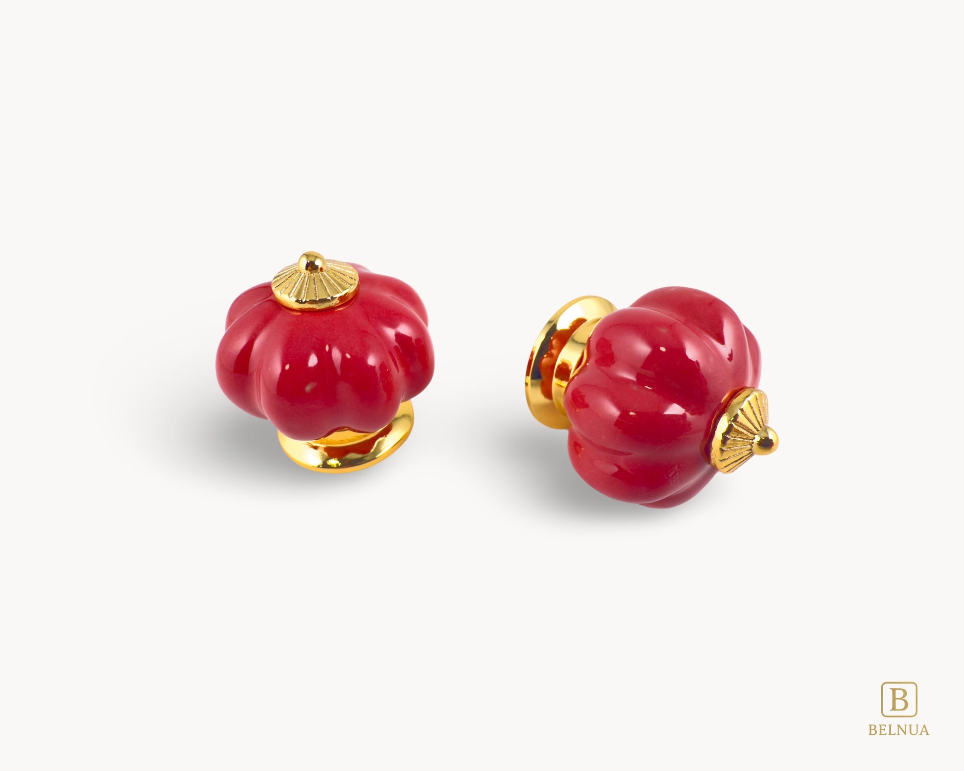 Belnua - Top and left side view of delightful Tavira cabinet porcelain knob in red colour with gold metal base in pumpkin shape 
