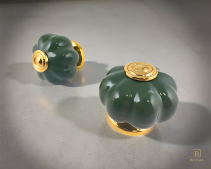 Belnua - Left side and top view of Tavira dark green porcelain knob pair with gold base for cabinets