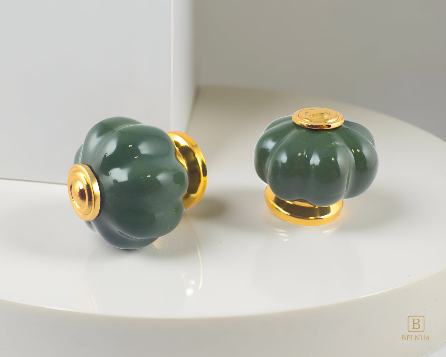 Belnua - Closeup view of Tavira porcelain/ceramic knob pair with left side and top view on quartz surface