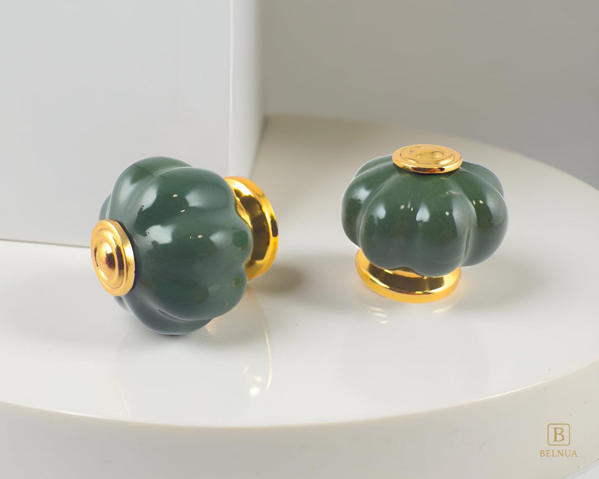 Belnua - Closeup view of Tavira porcelain/ceramic knob pair with left side and top view on quartz surface