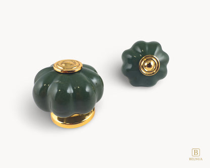 Belnua - Front and top view of Tavira gold base knob with dark green porcelain insert  for hallway cabinets