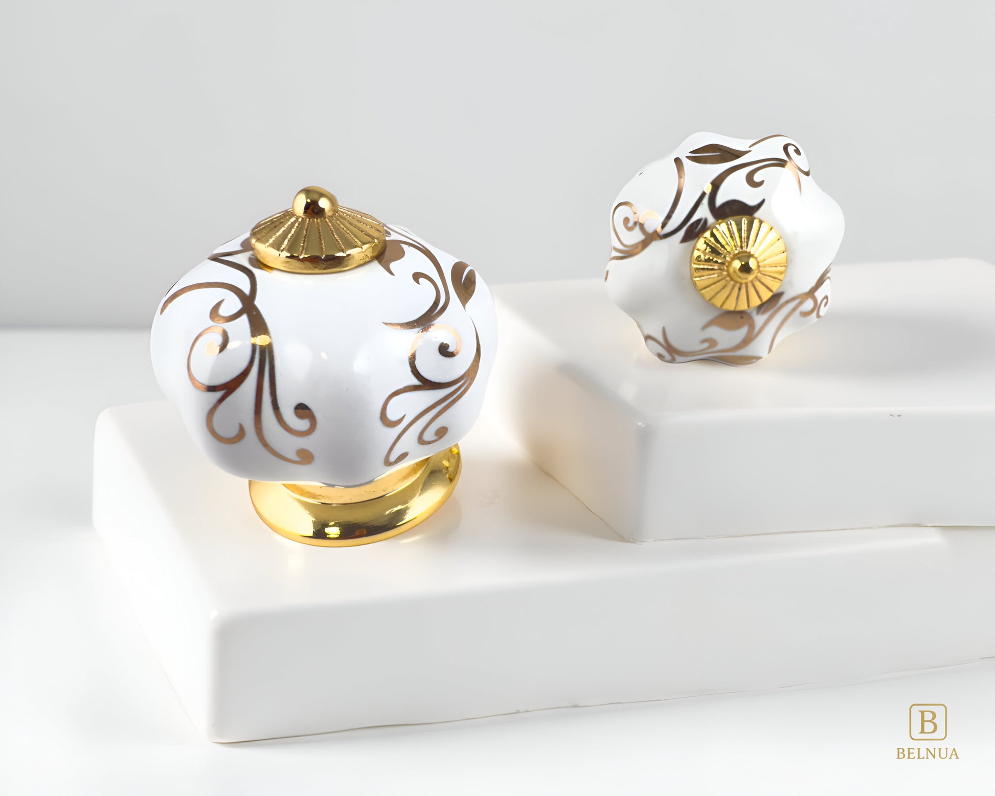 Belnua - Pair of luxury Tavira white porcelain cabinet knob with gold metal base on stepped quartz  surface