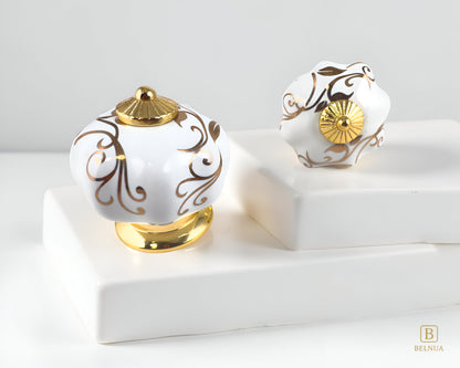 Belnua - Pair of luxury Tavira white porcelain cabinet knob with gold metal base on stepped quartz  surface