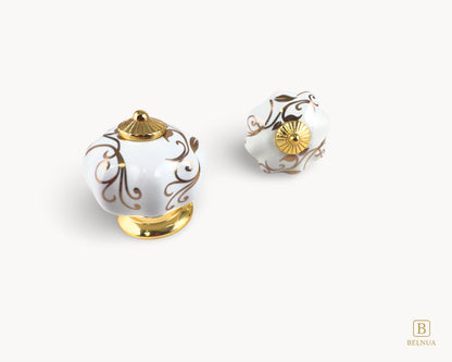 Belnua - Top and front view of luxury Tavira white porcelain cabinet knob with gold metal base
