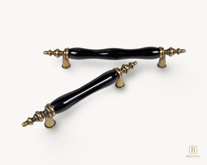 Belnua - Pair of Velnoa antique brass cabinet handle with black porcelain/ceramic insert