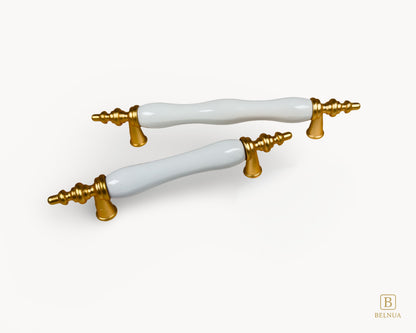Belnua - Velnoa matte gold cabinet handle pair with plain white porcelain/ceramic insert in perspective view